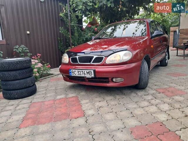 Красный Дэу Ланос, объемом двигателя 1.5 л и пробегом 157 тыс. км за 2450 $, фото 2 на Automoto.ua