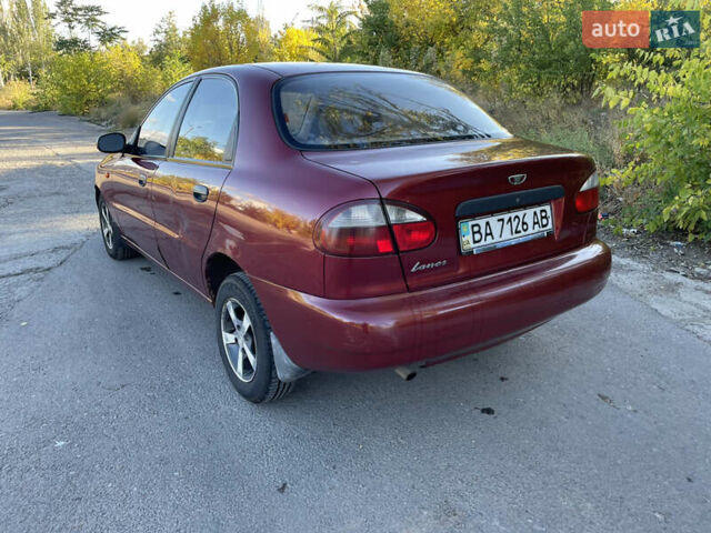 Красный Дэу Ланос, объемом двигателя 1.5 л и пробегом 200 тыс. км за 2150 $, фото 5 на Automoto.ua