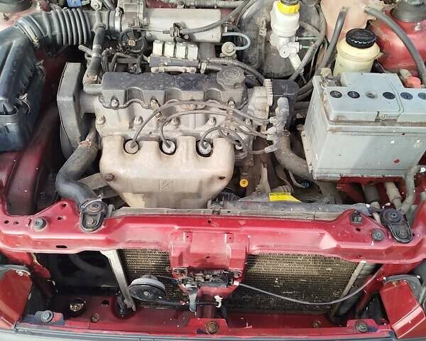 Красный Дэу Ланос, объемом двигателя 1.5 л и пробегом 216 тыс. км за 2500 $, фото 8 на Automoto.ua