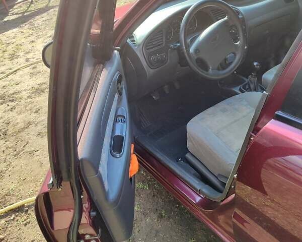 Червоний Деу Ланос, об'ємом двигуна 1.5 л та пробігом 161 тис. км за 2400 $, фото 11 на Automoto.ua