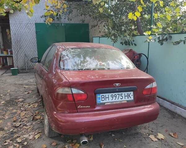 Червоний Деу Ланос, об'ємом двигуна 1.5 л та пробігом 199 тис. км за 1500 $, фото 1 на Automoto.ua