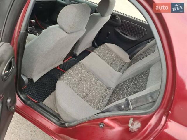 Червоний Деу Ланос, об'ємом двигуна 1.5 л та пробігом 250 тис. км за 1350 $, фото 1 на Automoto.ua