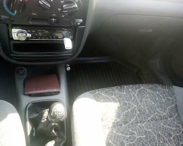Красный Дэу Ланос, объемом двигателя 1.5 л и пробегом 299 тыс. км за 2000 $, фото 18 на Automoto.ua
