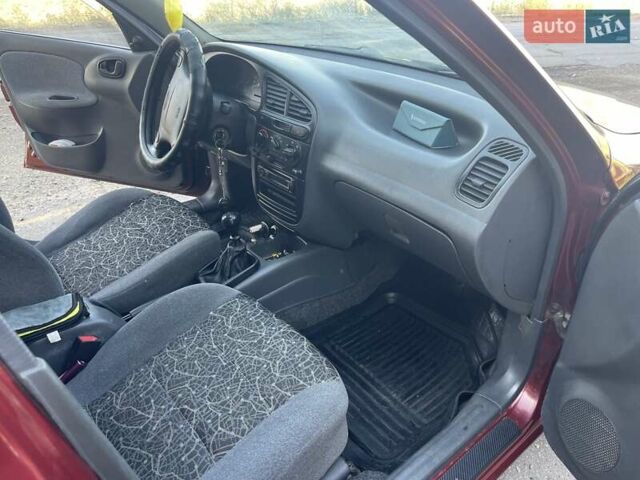 Красный Дэу Ланос, объемом двигателя 1.6 л и пробегом 161 тыс. км за 3300 $, фото 19 на Automoto.ua