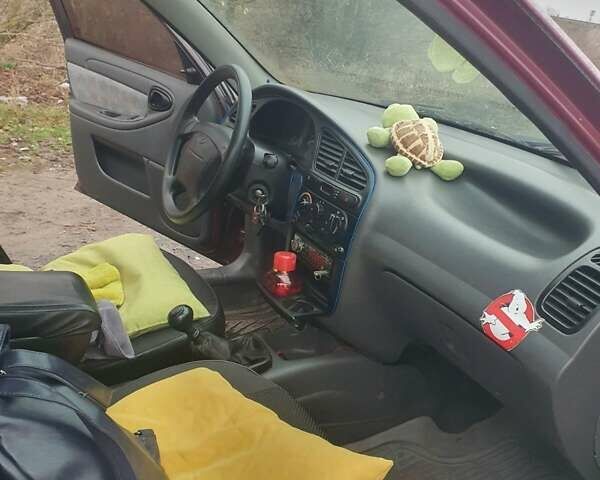 Красный Дэу Ланос, объемом двигателя 1.5 л и пробегом 226 тыс. км за 2400 $, фото 20 на Automoto.ua