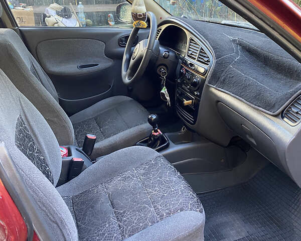 Деу Ланос 2005 у Коломаке на Automoto.ua Червоний Деу Ланос, об'ємом двигуна 1.5 л та пробігом 320 тис. км за 1700 $, фото 4 на Automoto.ua