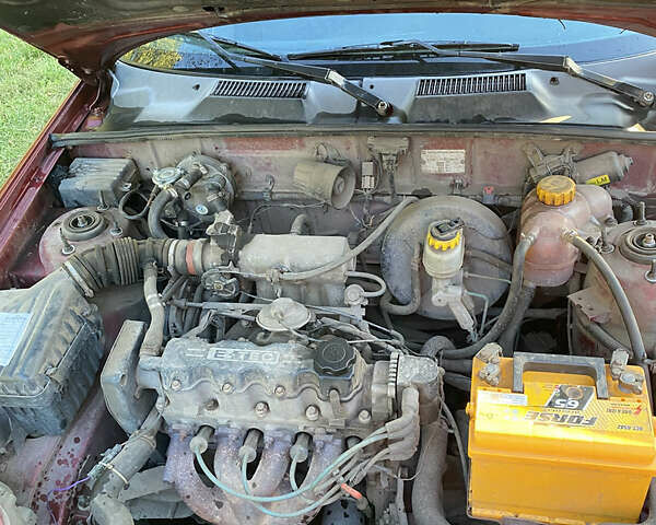 Деу Ланос 2005 у Коломаке на Automoto.ua Червоний Деу Ланос, об'ємом двигуна 1.5 л та пробігом 320 тис. км за 1700 $, фото 12 на Automoto.ua