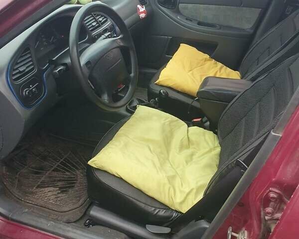 Красный Дэу Ланос, объемом двигателя 1.5 л и пробегом 226 тыс. км за 2400 $, фото 18 на Automoto.ua