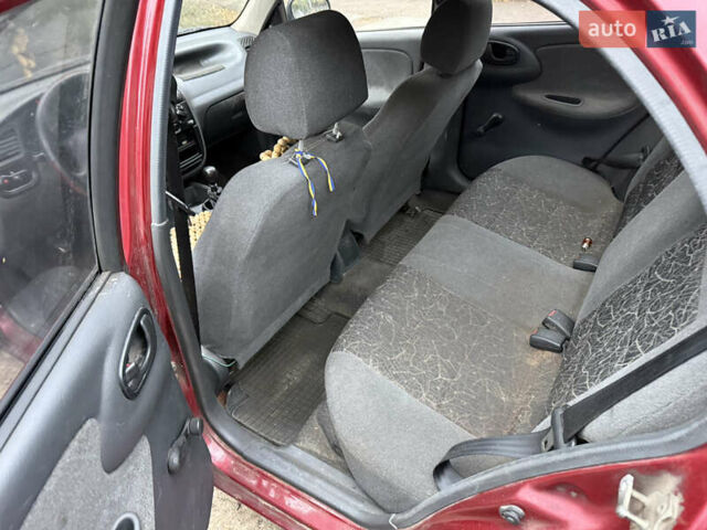Красный Дэу Ланос, объемом двигателя 1.5 л и пробегом 375 тыс. км за 1400 $, фото 8 на Automoto.ua