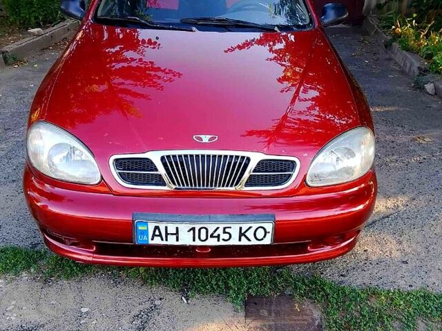 Красный Дэу Ланос, объемом двигателя 1.5 л и пробегом 230 тыс. км за 1700 $, фото 1 на Automoto.ua