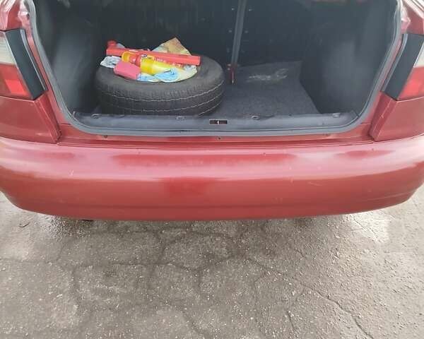 Красный Дэу Ланос, объемом двигателя 1.5 л и пробегом 216 тыс. км за 2500 $, фото 10 на Automoto.ua