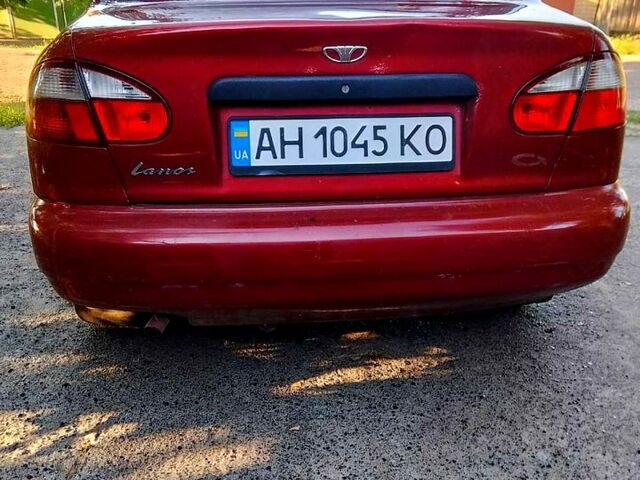 Красный Дэу Ланос, объемом двигателя 1.5 л и пробегом 230 тыс. км за 1700 $, фото 4 на Automoto.ua