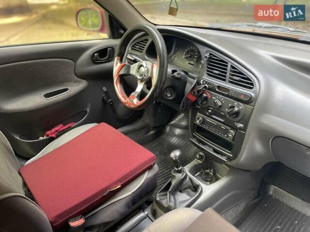 Червоний Деу Ланос, об'ємом двигуна 1.3 л та пробігом 128 тис. км за 1800 $, фото 3 на Automoto.ua