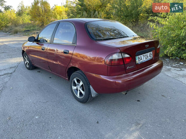Красный Дэу Ланос, объемом двигателя 1.5 л и пробегом 200 тыс. км за 2150 $, фото 4 на Automoto.ua