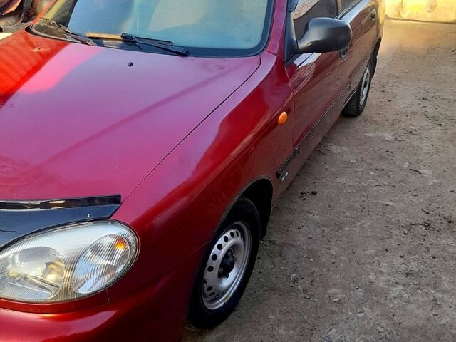 Красный Дэу Ланос, объемом двигателя 1.5 л и пробегом 200 тыс. км за 2500 $, фото 2 на Automoto.ua