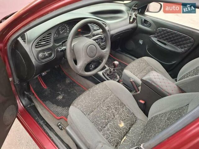 Червоний Деу Ланос, об'ємом двигуна 1.5 л та пробігом 250 тис. км за 1350 $, фото 3 на Automoto.ua