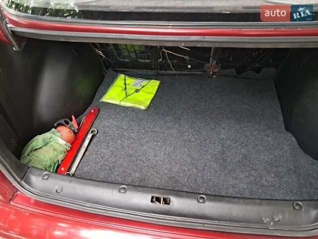 Красный Дэу Ланос, объемом двигателя 1.5 л и пробегом 157 тыс. км за 2450 $, фото 13 на Automoto.ua