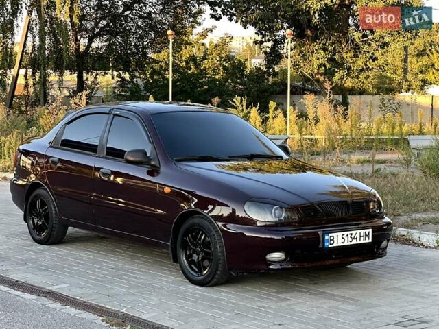 Красный Дэу Ланос, объемом двигателя 1.5 л и пробегом 150 тыс. км за 3300 $, фото 3 на Automoto.ua