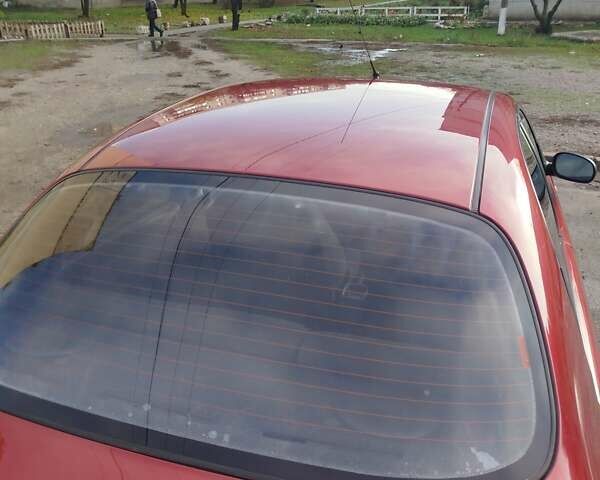 Красный Дэу Ланос, объемом двигателя 1.5 л и пробегом 216 тыс. км за 2500 $, фото 7 на Automoto.ua