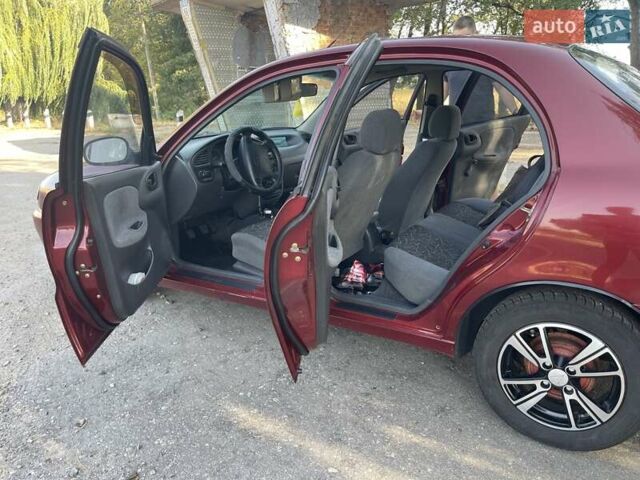 Красный Дэу Ланос, объемом двигателя 1.6 л и пробегом 161 тыс. км за 3300 $, фото 12 на Automoto.ua