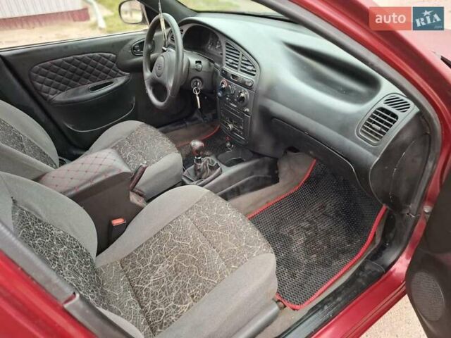 Червоний Деу Ланос, об'ємом двигуна 1.5 л та пробігом 250 тис. км за 1350 $, фото 5 на Automoto.ua