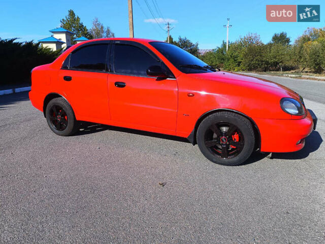 Красный Дэу Ланос, объемом двигателя 1.6 л и пробегом 187 тыс. км за 3150 $, фото 3 на Automoto.ua