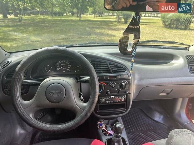 Красный Дэу Ланос, объемом двигателя 1.5 л и пробегом 59 тыс. км за 3750 $, фото 5 на Automoto.ua