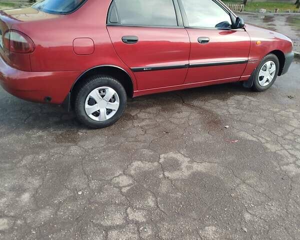 Красный Дэу Ланос, объемом двигателя 1.5 л и пробегом 216 тыс. км за 2500 $, фото 2 на Automoto.ua