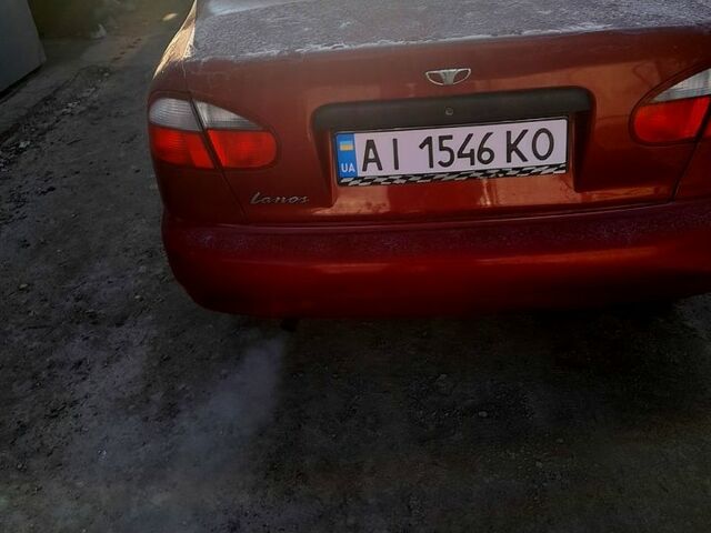Красный Дэу Ланос, объемом двигателя 1.5 л и пробегом 200 тыс. км за 2500 $, фото 1 на Automoto.ua