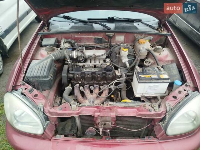 Красный Дэу Ланос, объемом двигателя 1.5 л и пробегом 245 тыс. км за 1100 $, фото 5 на Automoto.ua