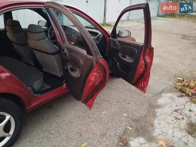 Червоний Деу Ланос, об'ємом двигуна 1.5 л та пробігом 230 тис. км за 1800 $, фото 9 на Automoto.ua