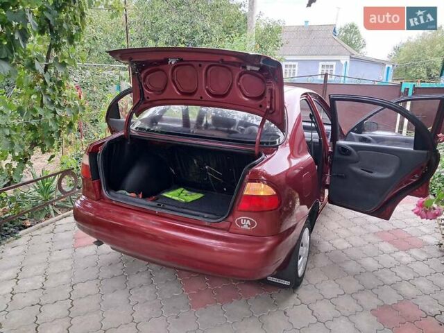 Красный Дэу Ланос, объемом двигателя 1.5 л и пробегом 157 тыс. км за 2450 $, фото 8 на Automoto.ua