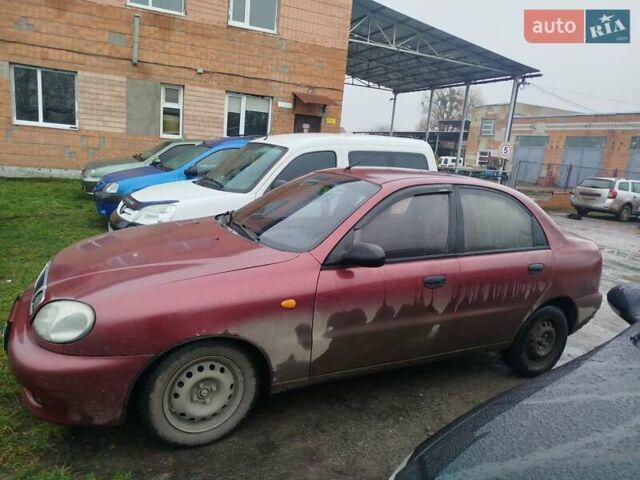 Красный Дэу Ланос, объемом двигателя 1.5 л и пробегом 245 тыс. км за 1100 $, фото 1 на Automoto.ua