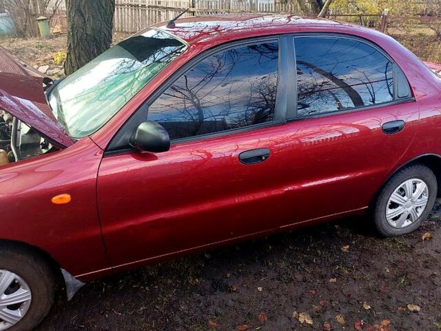 Красный Дэу Ланос, объемом двигателя 1.4 л и пробегом 180 тыс. км за 2400 $, фото 7 на Automoto.ua