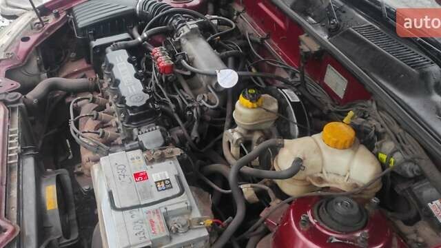Красный Дэу Ланос, объемом двигателя 1.5 л и пробегом 260 тыс. км за 2500 $, фото 14 на Automoto.ua