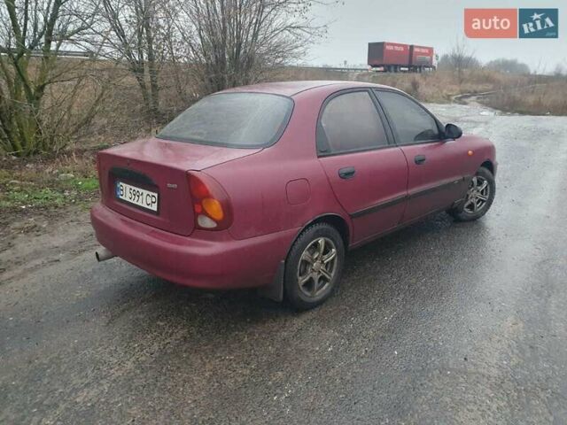 Красный Дэу Ланос, объемом двигателя 1.5 л и пробегом 226 тыс. км за 2400 $, фото 4 на Automoto.ua