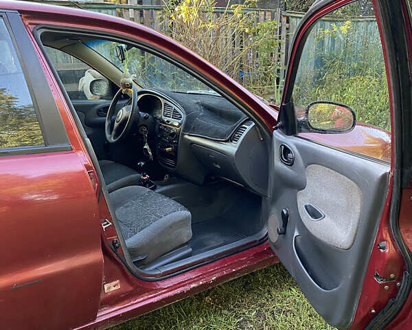 Деу Ланос 2005 у Коломаке на Automoto.ua Червоний Деу Ланос, об'ємом двигуна 1.5 л та пробігом 320 тис. км за 1700 $, фото 2 на Automoto.ua