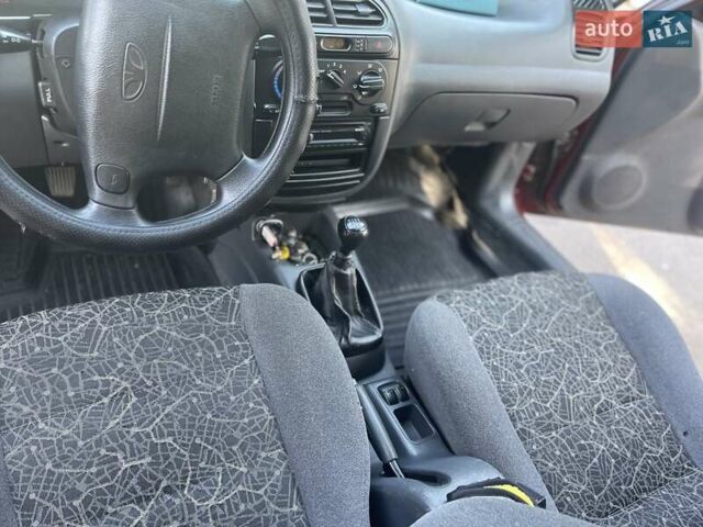 Красный Дэу Ланос, объемом двигателя 1.6 л и пробегом 161 тыс. км за 3300 $, фото 13 на Automoto.ua