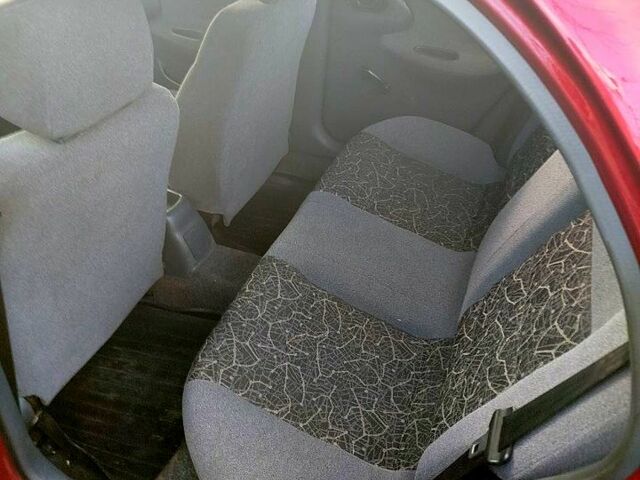 Красный Дэу Ланос, объемом двигателя 1.4 л и пробегом 180 тыс. км за 2400 $, фото 2 на Automoto.ua