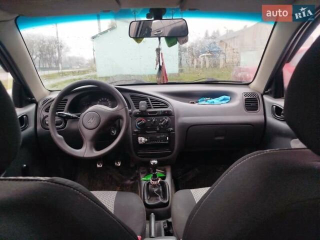 Красный Дэу Ланос, объемом двигателя 1.5 л и пробегом 245 тыс. км за 1100 $, фото 4 на Automoto.ua
