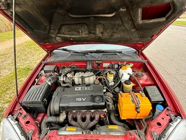 Красный Дэу Ланос, объемом двигателя 1.6 л и пробегом 275 тыс. км за 2390 $, фото 3 на Automoto.ua