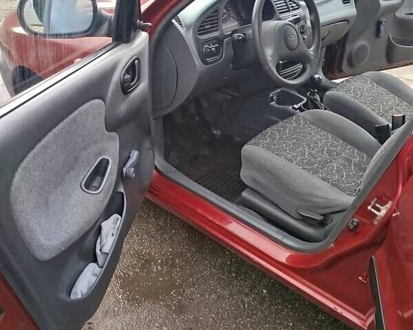 Красный Дэу Ланос, объемом двигателя 1.5 л и пробегом 216 тыс. км за 2500 $, фото 11 на Automoto.ua