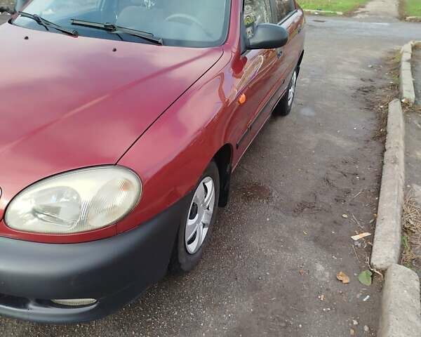 Красный Дэу Ланос, объемом двигателя 1.5 л и пробегом 216 тыс. км за 2500 $, фото 1 на Automoto.ua