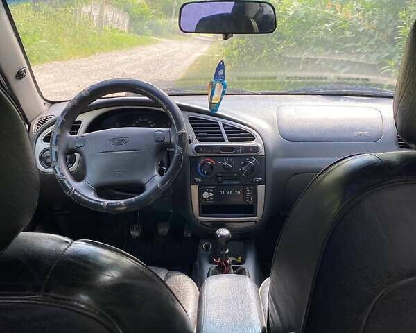 Красный Дэу Ланос, объемом двигателя 1.6 л и пробегом 222 тыс. км за 2660 $, фото 9 на Automoto.ua