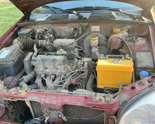 Деу Ланос 2005 у Коломаке на Automoto.ua Червоний Деу Ланос, об'ємом двигуна 1.5 л та пробігом 320 тис. км за 1700 $, фото 11 на Automoto.ua