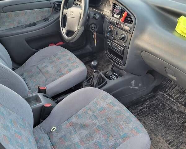 Червоний Деу Ланос, об'ємом двигуна 1.5 л та пробігом 470 тис. км за 1500 $, фото 4 на Automoto.ua