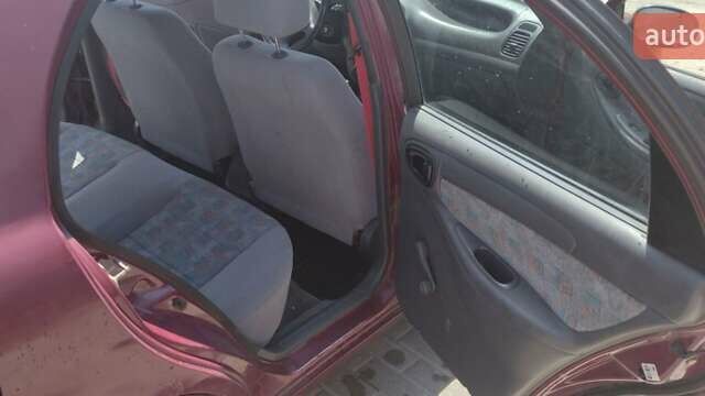 Красный Дэу Ланос, объемом двигателя 1.5 л и пробегом 477 тыс. км за 1250 $, фото 14 на Automoto.ua
