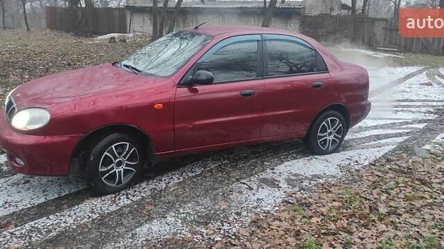 Красный Дэу Ланос, объемом двигателя 1.5 л и пробегом 260 тыс. км за 2500 $, фото 2 на Automoto.ua