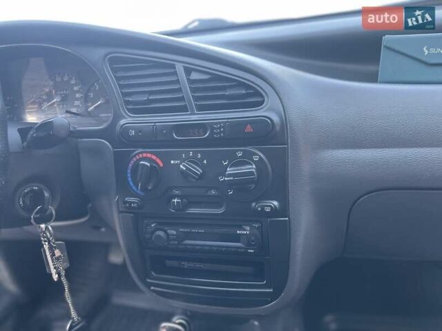 Красный Дэу Ланос, объемом двигателя 1.6 л и пробегом 161 тыс. км за 3300 $, фото 17 на Automoto.ua