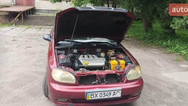Красный Дэу Ланос, объемом двигателя 1.4 л и пробегом 430 тыс. км за 2000 $, фото 12 на Automoto.ua